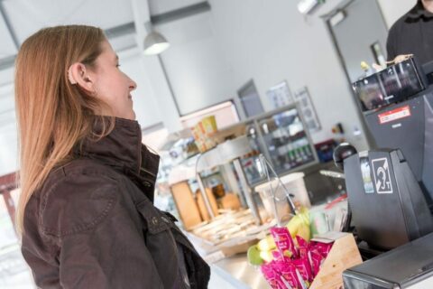 Customer ordering at a cafe