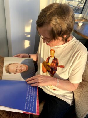 A young woman looking at a book