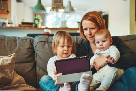 Family looking at a tablet