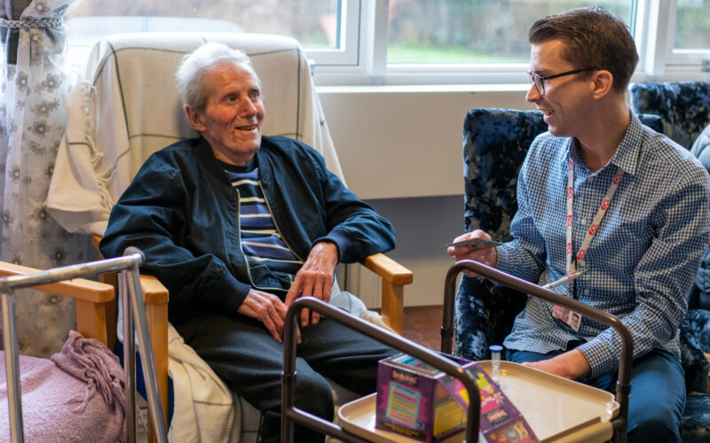 Customer enjoying some company with a carer