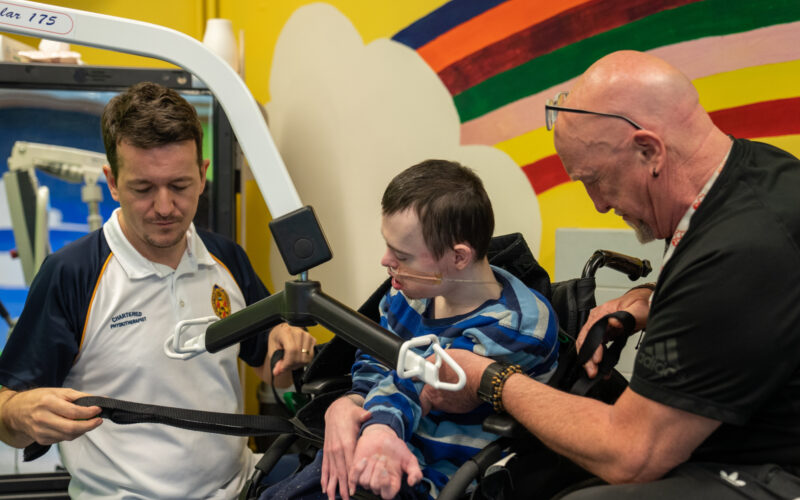 Carer helping out man