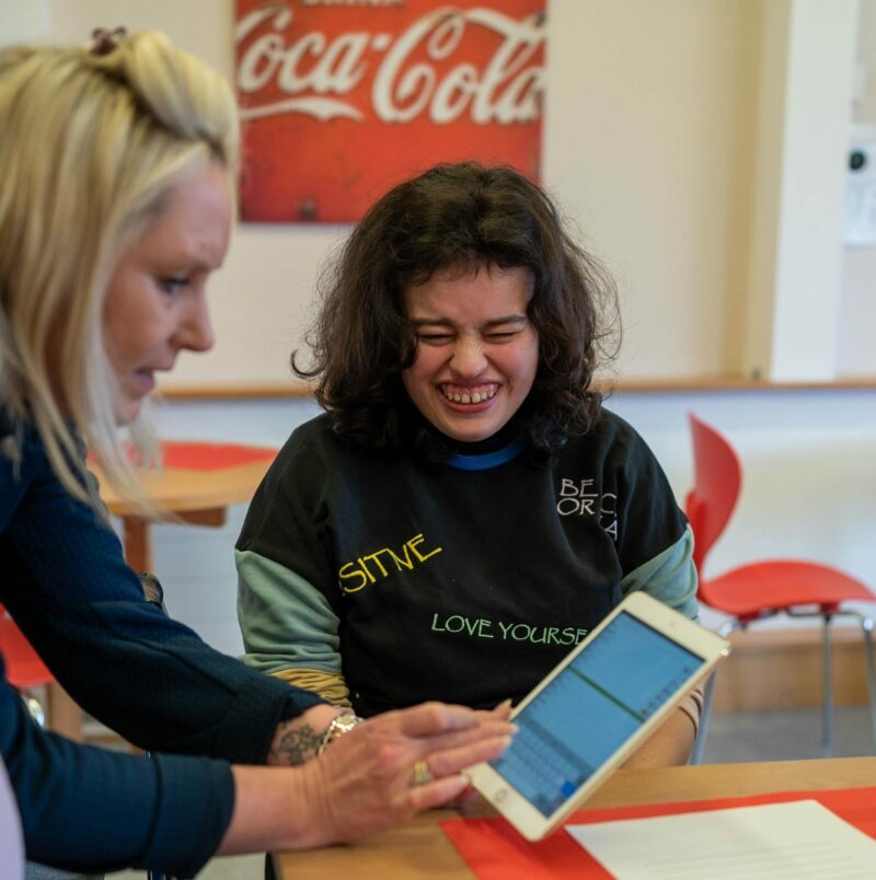 Carer making women laugh