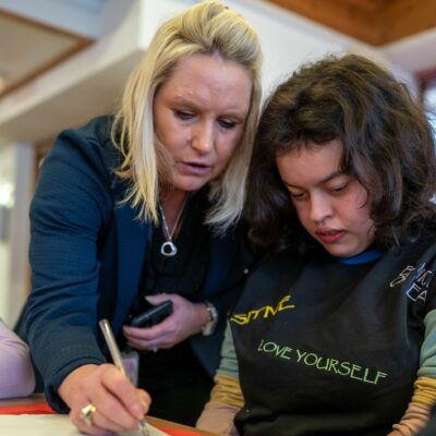 Carer helping customer