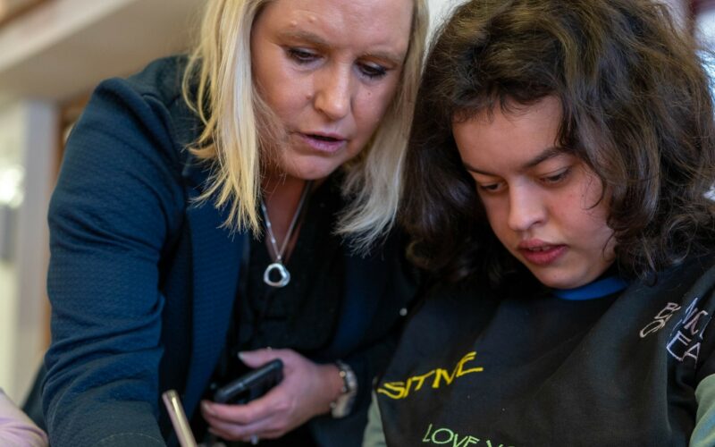 Carer helping customer