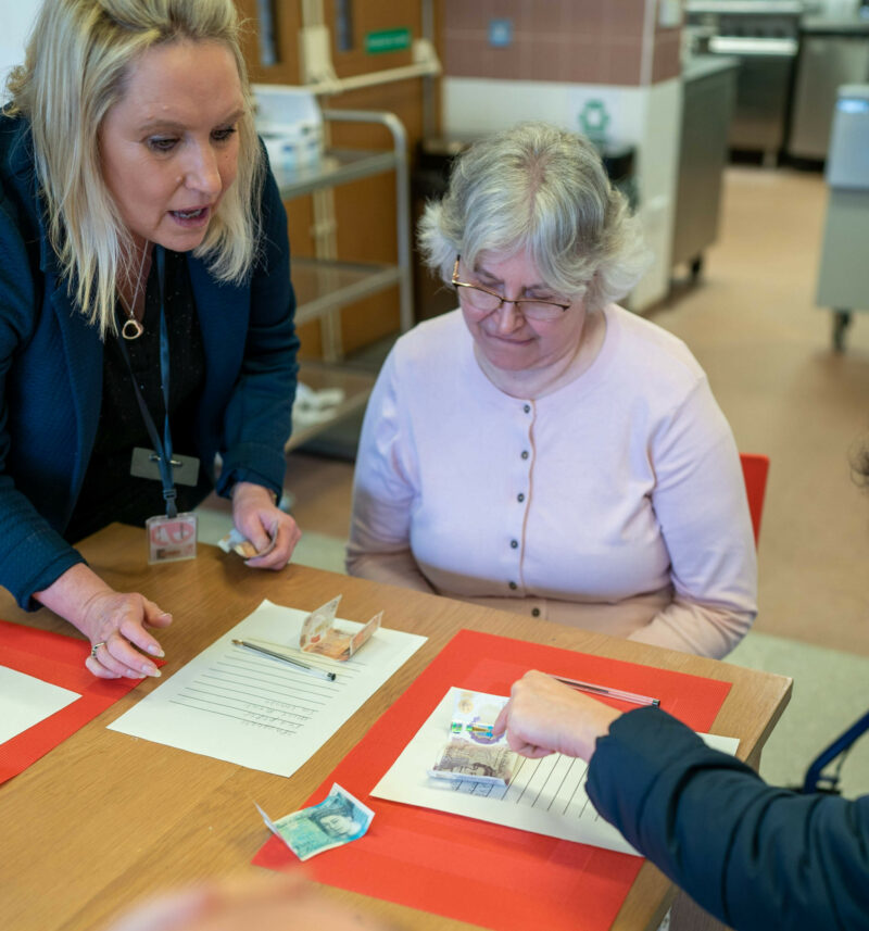 Learning about money in Saffron Walden day centre