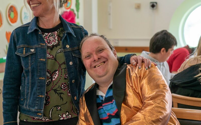 man with learning disabilities with a member of day centre support staff