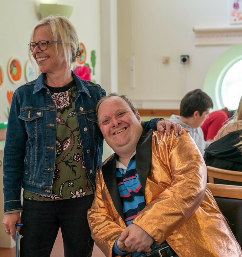 man with learning disabilities with a member of day centre support staff