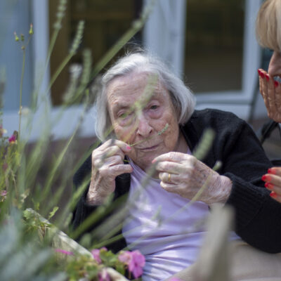 Customer smelling plants