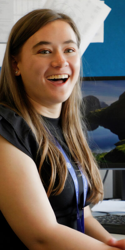 young lady with autism working in office of Hylands School, Chelmsford