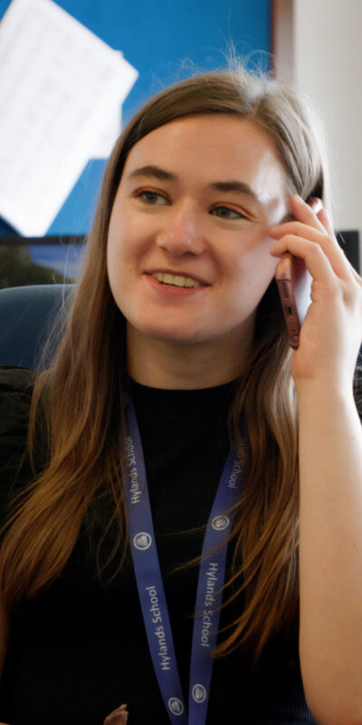 young lady with autism working as an admin assistant at Hylands School, Chelmsford