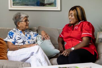 ECL customer and Community Care Assistant chatting