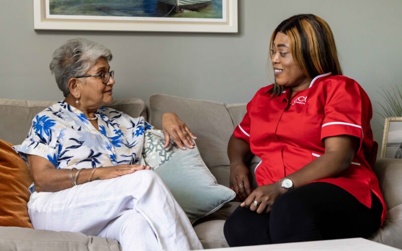 ECL customer and Community Care Assistant chatting