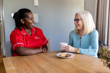 ECL employee and customer chatting