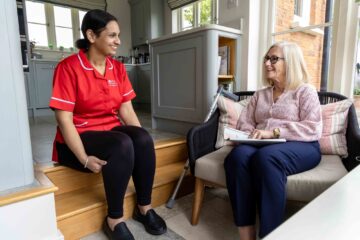 ECL customer and Community Care Assistant chatting