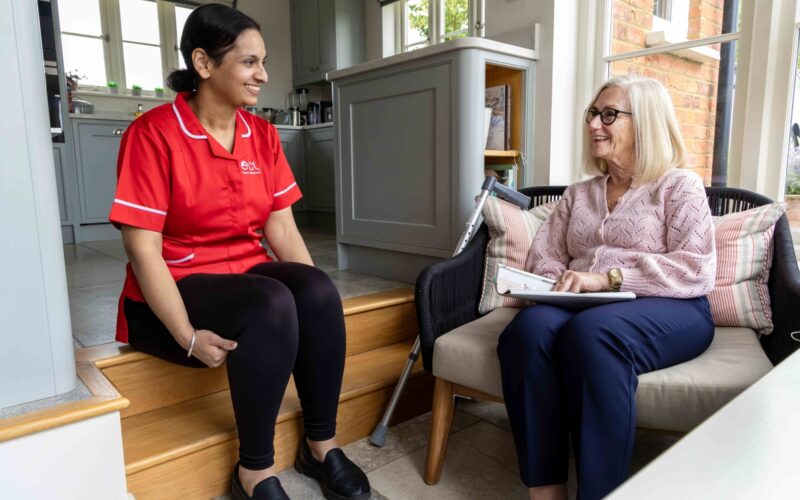 ECL customer and Community Care Assistant chatting