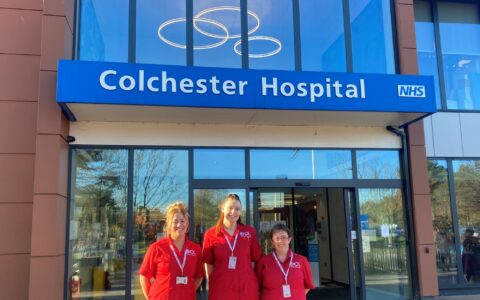 3 Employees standing outside Colchester Hospital