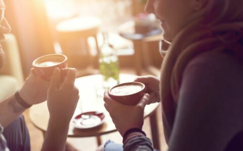 2 people enjoying a coffee together