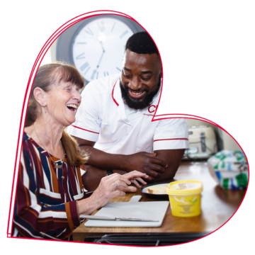 Happy man supporting an older women at home