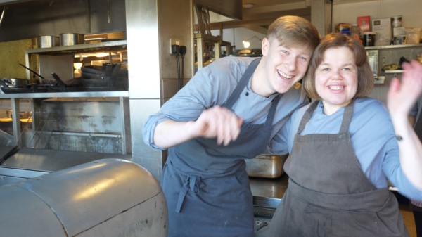 Young lady with hearing impairment working at pub and restaurant, The Lion Inn