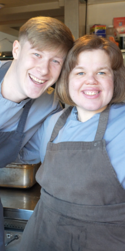 Young lady with hearing impairment working at pub and restaurant, The Lion Inn