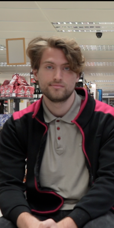 Young man with autism, working in an East of England store.
