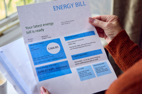 Person holding their energy bill